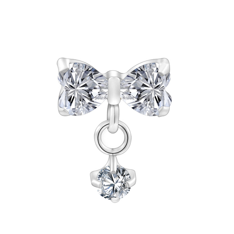 Accessoire interne Titane 0.9 motif nœud papillon pendant strass blanc | iTC